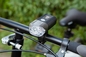 La nuit montant le vélo rechargeable de LED allume l'ABS d'éclat de 50%